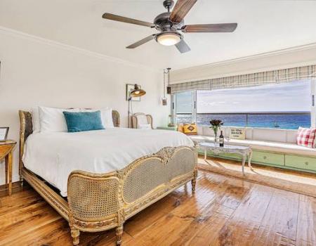 A bedroom with ocean view 