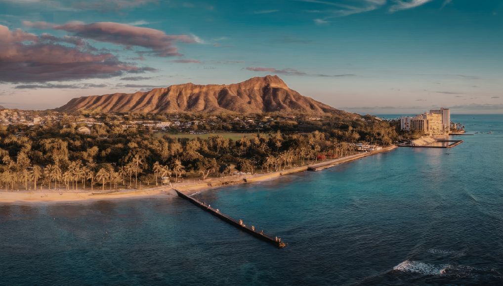 Aerial view of Waikiki Beach and Diamond Head, a top area to stay on Oahu